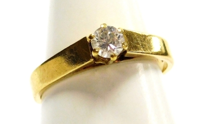 An 18ct gold and diamond solitaire ring, high claw set approximately ¼ct, size O/P, 3.6g.