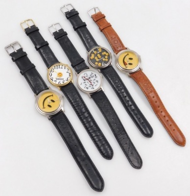 Five Joe Boxer gentleman's wristwatches, comprising a floating hands watch, floating smiley faces watch, watch with large numbers and central smiley face, and two smiley face watches on black and brown straps. - 2