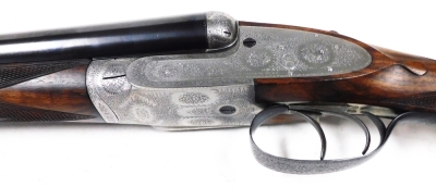 A Purdey 12 bore side by side shotgun, hammerless ejector, No. 17153, the No.2 gun of a pair, circa 1901. James Purdy & Son Ltd advised that this gun was originally ordered in October 1900 by Mr R.S. Lamb, Allaus Grove(?), Ireland and delivered in July 19 - 2