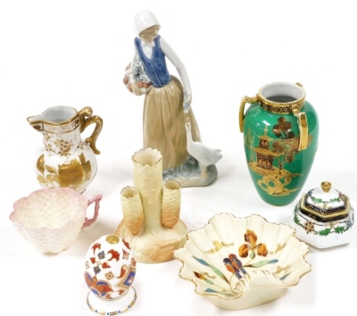 A group of 19thC and later porcelain, including a Belleek cup, Royal Ivy porcelain bud vase, Noritake porcelain vase, Royal Crown Derby porcelain egg on stand (England) Eggs of The World, Nao figure of a girl with a duck, together with an early 19thC Maso