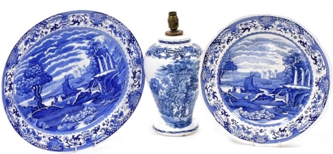 A Booths blue and white meat platter decorated in the Old Danube pattern, together with a circular plate and a blue and white table lamp, with shade, decorated in the British Scenery pattern. (3) Buyer Note: WARNING! This lot contains untested or unsafe 