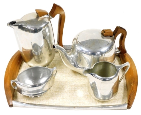 A Picquot ware five piece tea set, comprising teapot, hot water jug, milk jug and sugar bowl, together with a twin handled tray.