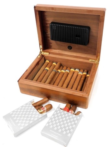 A Dunhill cedarwood humidor, with silver plate to lid engraved ''MJ Pointer QC, 16th April 1996'', containing Cohiba and other cigars, 28cm wide, 22.5cm deep.