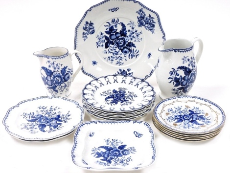 A group of 19thC Booths blue and white pottery, decorated in the Pine Cone pattern, comprising dinner and dessert plates, pair of bread plates, large circular dish, and a pair of graduated water jugs.