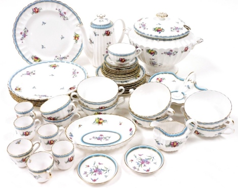 A Spode porcelain part dinner, tea and coffee service, decorated in the Trapnell Sprays pattern, comprising a soup tureen and cover, six soup cups and saucers, eight dinner plates, scallop shaped dish, oval dish, coffee pot, cream jug, six coffee cans and