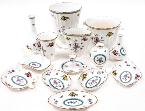 Spode porcelain vases and jardinieres, decorated in the Trapnell pattern, together with an ornamental basket, leaf shaped dish, chamber stick, and oval dishes. (a quantity)