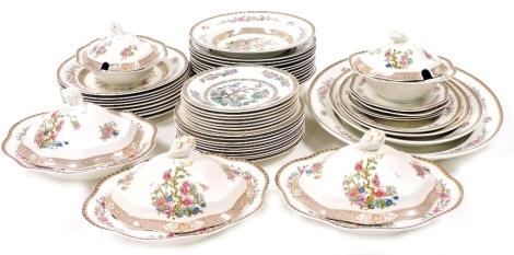 A composite Johnson Brothers and Lord Nelson pottery dinner service, decorated in the Indian Tree pattern, including meat platters, vegetable and sauce tureens and covers, dinner, soup, dessert and side plates. (a quantity)