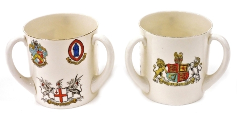 A Goss tyg form tankard, commemorating and bearing the arms of Her Majesty Queen Victoria and two verses by Adolphus Goss, and a similar crested tankard for The City Of London, also bearing the arms of Hammersmith and St Mary's Hospital. (2) (AF)