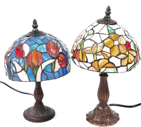 Two Tiffany style table lamps, with floral glass shades, 36cm and 31cm high.