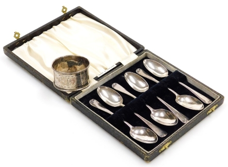 A set of six Victorian silver teaspoons, Francis Higgins, London 1888, in fitted box, and a silver napkin ring, 2.14oz.