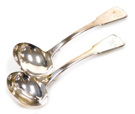 A pair of George III silver Fiddle pattern ladles, each with engraved initials to handle, London 1819, 3.84oz.