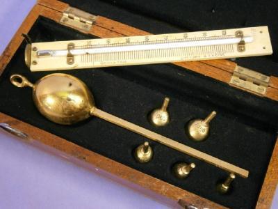 A cased Customs and Excise saccharometer