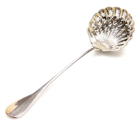 A late 19thC French silver sifter spoon, the handle cast with armorial crest, with a shell shaped pierced bowl, Henri Gabert, 2.48oz, 21cm long.