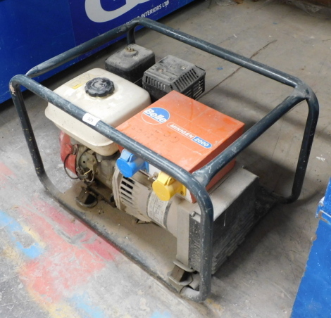 A Bell Mini Gen 2000 portable generator. Note: VAT is payable on the hammer price of this lot at 20%. To be sold upon instructions from Grantham Ceilings & Interiors Ltd (in proposed liquidation), viewing and collection is from their premises at Ellesmere