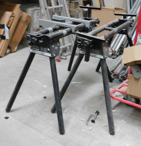 Two Evolution mitre saw stands. Note: VAT is payable on the hammer price of this lot at 20%. To be sold upon instructions from Grantham Ceilings & Interiors Ltd (in proposed liquidation), viewing and collection is from their premises at Ellesmere Business