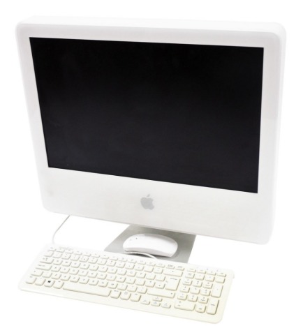 An Apple iMac 20" monitor, with a Perixx keyboard and a wireless mouse.