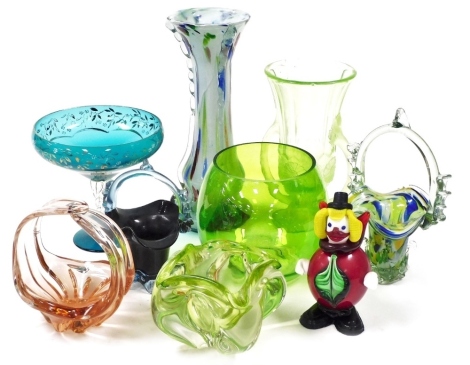 A group of glassware, to include a Murano glass style model of a clown, 18cm high, a Murano style mottled glass vase, 32cm high, green glass comport with gilt highlights, 18cm high, glass baskets, etc. (a quantity)