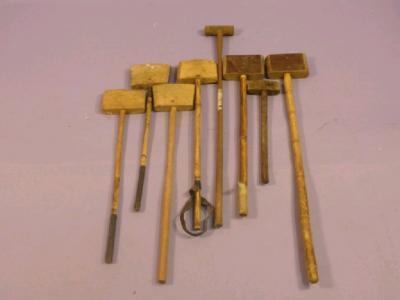 A quantity of floggers or bung mallets for removal of bungs from barrels