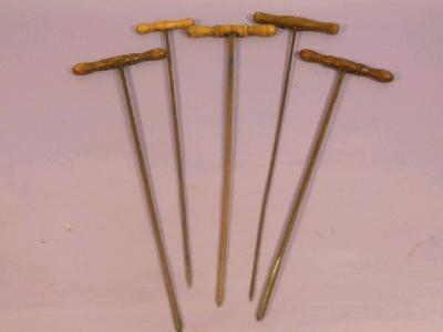 Five wooden handled Customs augers