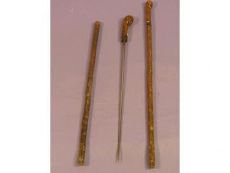 Two root wood tuck sticks