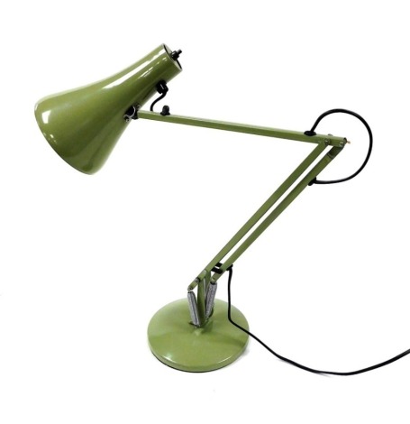 A pale green Anglepoise type desk lamp.