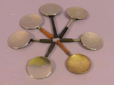 Seven assorted refractometer/reflector pans