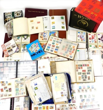 Philately: GB and world stamps, QV-EII, in albums, stock books and loose, mint commemorative's, postcards, first day covers, etc. (a quantity)