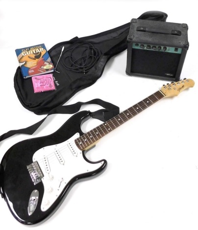 A Stagg black electric guitar, with rosewood finger board, together with an amplifer, 10GA.