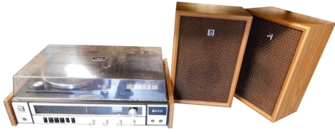 A Sanyo record player cassette turn table, model G2711-Super, with a pair of speakers.