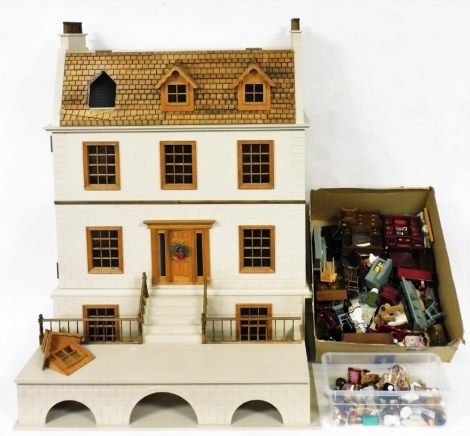 A Georgian style dolls house, with electric wiring, 107cm high, 80cm wide, 62cm deep, together with dolls house furniture, ornaments and teddy bear figures.