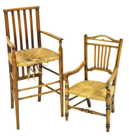 A late 19thC country made beech child's high chair, with a slatted back, a rush seat on turned tapering legs, (AF), and a similar child's open armchair, (2).