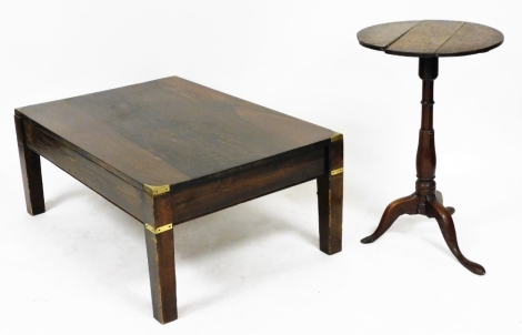 A rectangular oak and brass bound coffee table, raised on square legs, 40cm high, 101cm wide, 67.5cm deep, together with a 19thC oak occasional table, with a circular top raised on a baluster turned columns over three cabriole legs, 70cm high, 45cm diamet