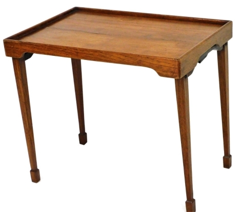 An Eastern teak galleried folding table, 69cm wide.