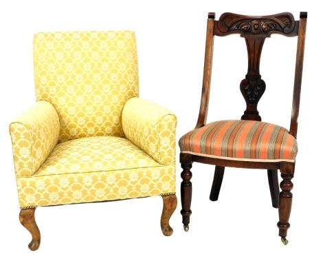 An early 20thC armchair, upholstered in gold patterned fabric on cabriole legs, and a Victorian walnut side chair with striped upholstery on turned legs. (2)