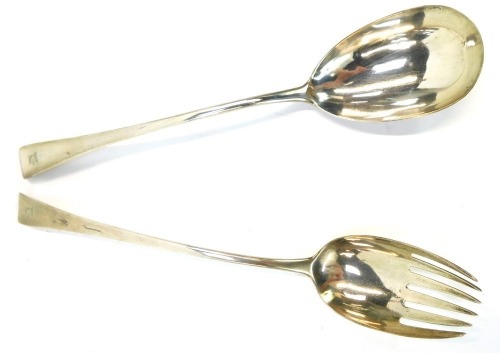 Victorian and later silver salad servers, comprising a serving fork and ladle, Fiddle pattern with bull crest, the ladle London 1818, the fork London 1830, 6¼oz.