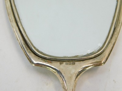 An Elizabeth II silver dressing table mirror, of Neo Classical design and vacant cartouche, Birmingham 1961. - 2