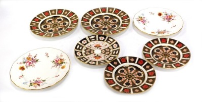 Two Royal Crown Derby Imari pattern plates, 27cm diameter, two large Posies pattern plates and three Imari pattern side plates. (7)