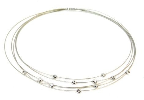 A Leslie Donn 18ct white gold diamond necklace, with a five row layered design with round brilliant cut diamonds, each in a rub over setting, 15cm long overall, 13.4g all in.