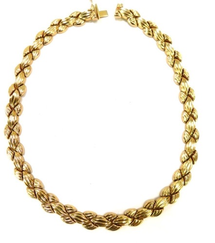 A Pobjoy 9ct gold necklace, of ribbed abstract design, 40cm long, 42.1g all in.