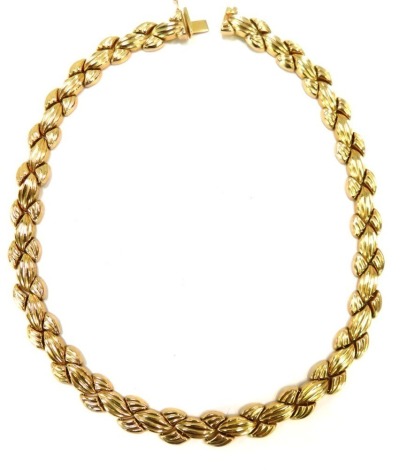 A Pobjoy 9ct gold necklace, of ribbed abstract design, 40cm long, 42.1g all in.