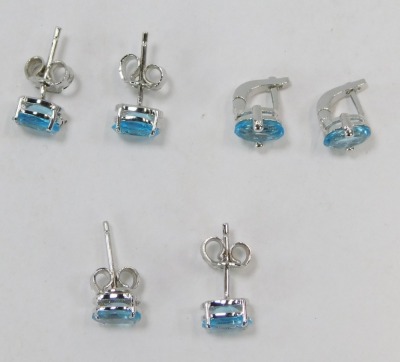 Three pairs of silver and blue zircon set studs, comprising two oval plain studs and a pair of half hoop backed studs, 4.7g all in. (3) - 2