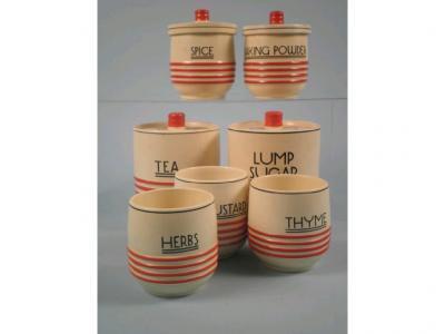 A set of five Mintons kitchen storage jars and three other containers for lump sugar