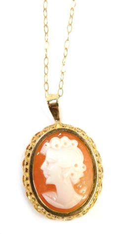 A 9ct gold pendant and chain, the cameo set with quarter profile of a female in a 9ct gold frame on a 9ct gold fine length neck chain, 2.4g all in.