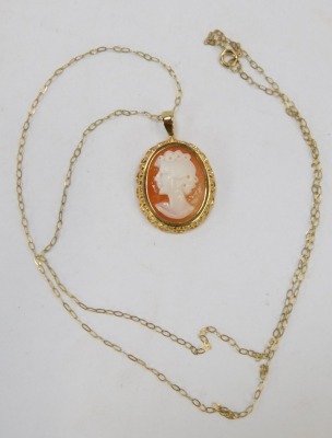 A 9ct gold pendant and chain, the cameo set with quarter profile of a female in a 9ct gold frame on a 9ct gold fine length neck chain, 2.4g all in. - 2