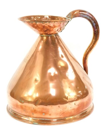 An early 20thC copper harvest jug, of large proportion, 25cm high. (AF)