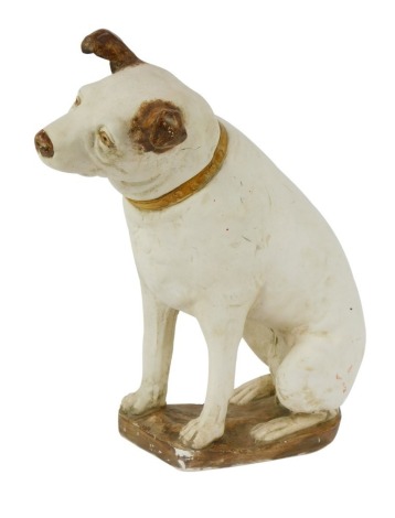 A late 20thC plaster HMV style advertising dog, seated, 32cm high.