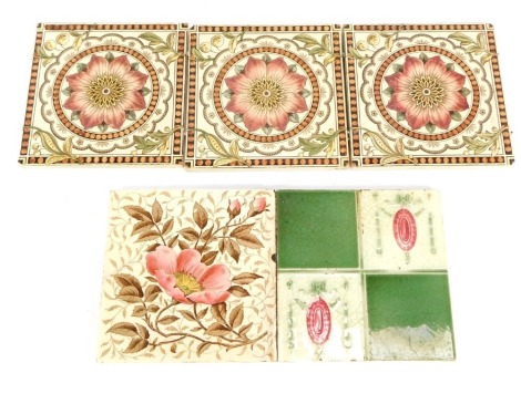 Three late 19thC pottery hearth tiles, Minton style, No F5RDN163780, florally decorated, 15cm wide, and two others. (5)