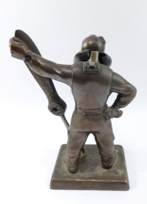 An aviation table lighter, of a pilot holding propeller, with detachable head, 30cm high. (AF) - 2