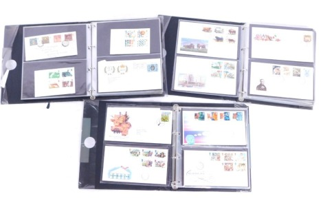 A collection of c.100 first day covers, in three albums.