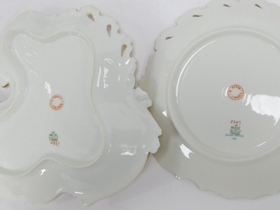 A Limoges French porcelain part dessert service, comprising a cake plate, shell scallop dish, six plates, each on a cream ground, with pink gilt flower decoration. (AF) - 2